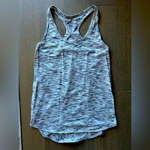 Grey Lululemon workout shirt. Size 4.